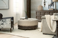 Picture of LA GRANGE GIDDINGS ROUND UPHOLSTERED COCKTAIL OTTOMAN